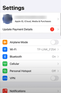 Tap on your Apple ID name at the top of the screen.